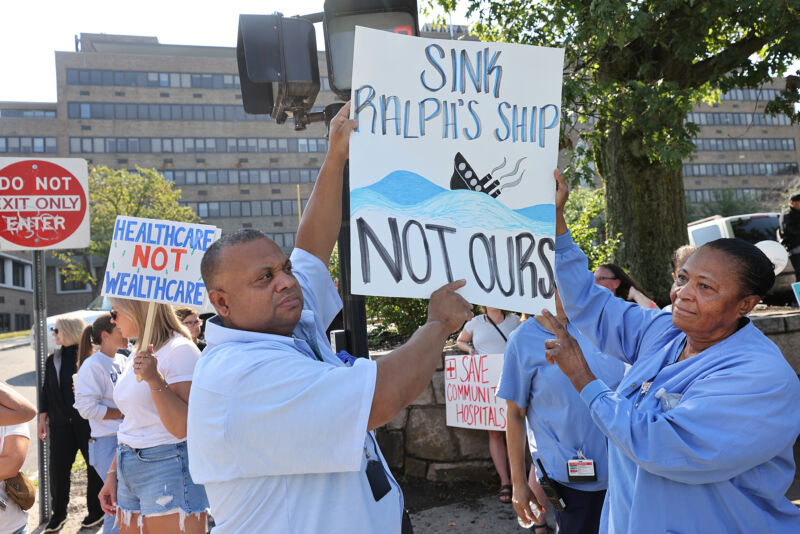 Hospital workers and community members staged a protest outside Carney Hospital in Boston on Aug. 5 as Steward announced he was closing the hospital. "Ralph" refers to Steward CEO Ralph de la Torre, who owns the yacht.